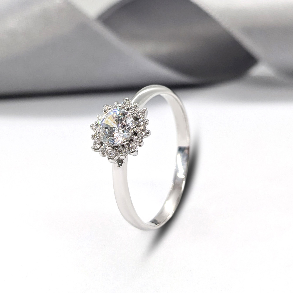 silver ring with round crystal