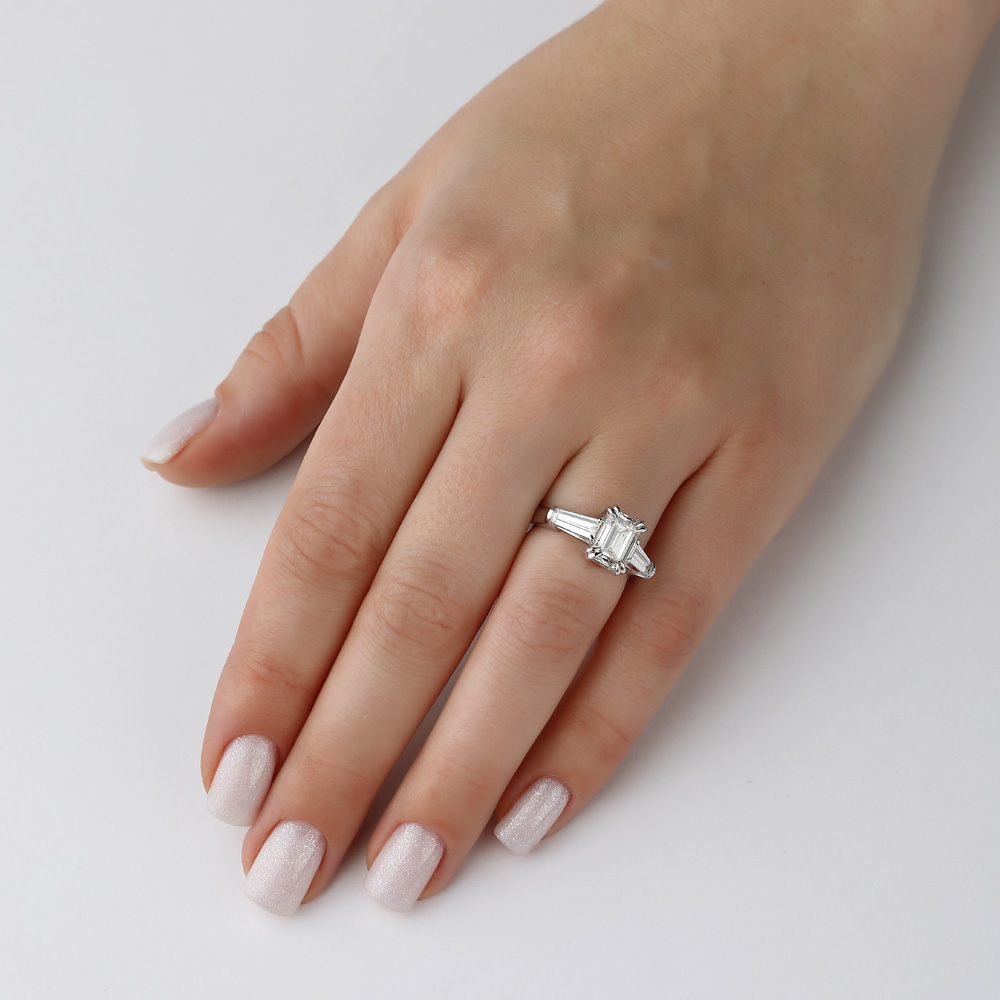 white gold engagement ring with 2 ct lab diamond emerald cut and tepered baguettes R-00874_ Oprah