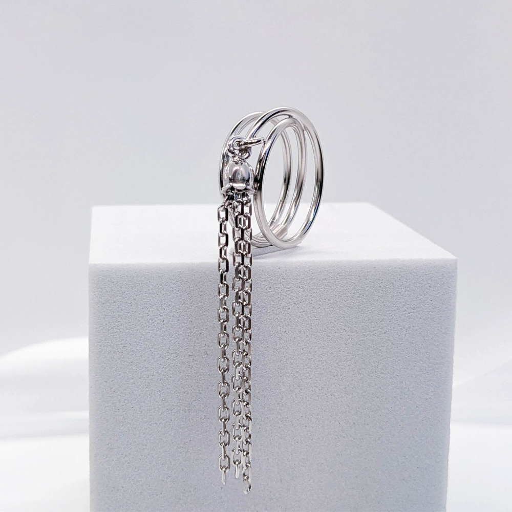 silver ring with chain pendant