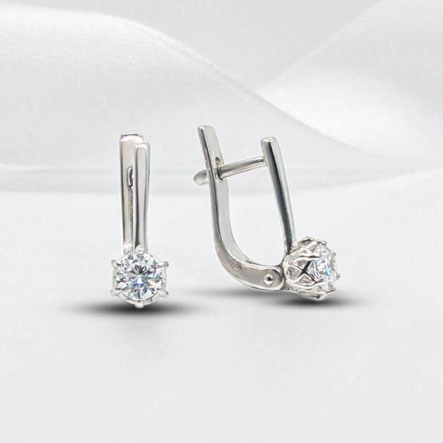 Cute silver earrings with single crystals